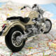 miniatura de una moto sobre un mapa